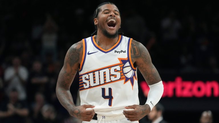 Phoenix Suns guard Jalen Green celebrates a made 3-pointer against the Los Angeles Clippers during the second half of an NBA basketball game Thursday, Nov. 6, 2025, in Phoenix. (AP Photo/Ross D. Franklin)