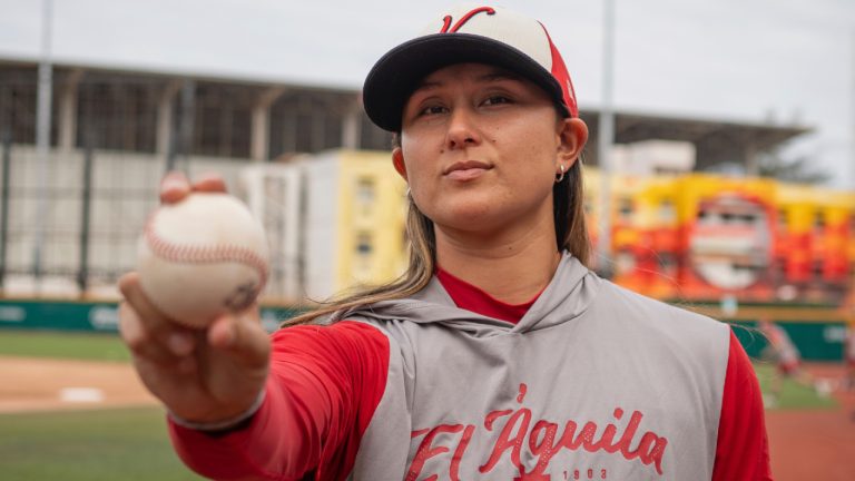 Kelsie Whitmore poses for a photo with a ball during a training session with the Aguila de Veracruz profesional baseball team in Veracruz, Mexico, Tuesday, April 8, 2025. (Victoria Razo/AP)