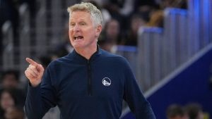 Golden State Warriors head coach Steve Kerr gestures toward players during the first half of an NBA basketball game against the Memphis Grizzlies in San Francisco, Monday, Oct. 27, 2025. (AP Photo/Jeff Chiu)