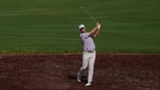 Hojgaard leads World Tour Championship with McIlroy in pursuit