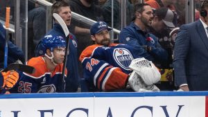 Edmonton Oilers goalie Stuart Skinner (74) sits on the bench after being pulled against the Colorado Avalanche during second period NHL action, in Edmonton on Saturday, November 8, 2025. (Jason Franson/CP)