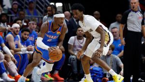 Oklahoma City Thunder guard Shai Gilgeous-Alexander (2) dribbles around New Orleans Pelicans forward Herbert Jones (2) during the first quarter of an NBA basketball game, Monday, Nov. 17, 2025, in New Orleans. (Butch Dill/AP)