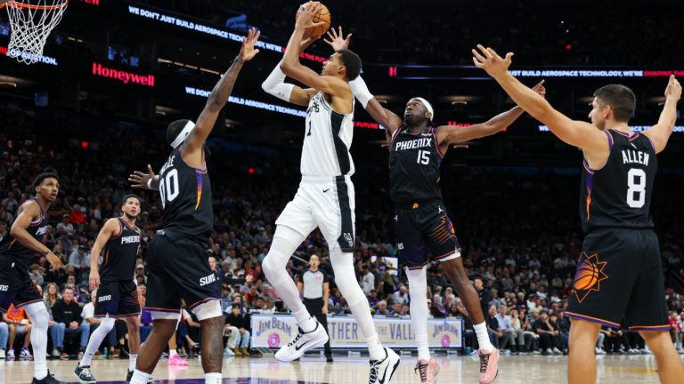 San Antonio Spurs forward Victor Wembanyama (1) looks to shoot during the second half of an NBA basketball game, Sunday, Nov. 2, 2025, in Phoenix. (Mike Christy/AP)