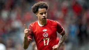Canada's Tajon Buchanan, celebrates his goal against Honduras during the second half of a Concacaf Gold Cup soccer match in Vancouver, on Tuesday, June 17, 2025. (Ethan Cairns/CP)