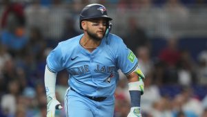 Toronto Blue Jays' Bo Bichette runs after a single during a baseball game against the Miami Marlins, Sunday, Aug. 24, 2025, in Miami. (Marta Lavandier/AP)