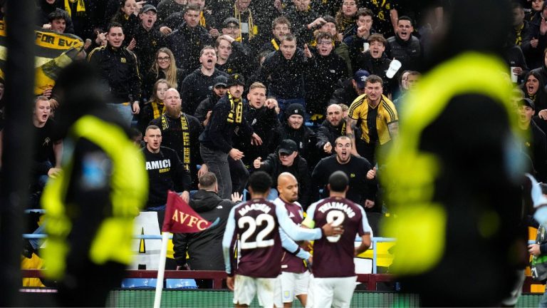 Young Boys' fans react as Aston Villa's Donyell Malen, centre, celebrates after scoring the opening goal during the Europa League soccer match between Aston Villa and Young Boys in Birmingham, England, Thursday, Nov. 27, 2025. (Nick Potts/AP)