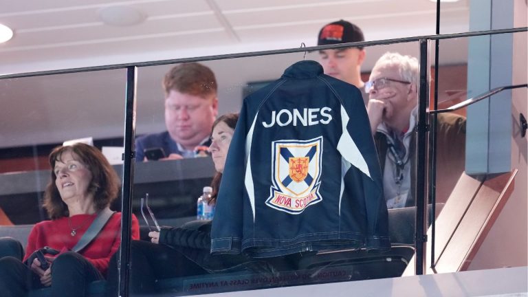 A provincial championship jacket belonging to Colleen Jones hangs in a suite as friends and family watch Canadian Olympic curling trials semifinal action in Halifax, Thursday, Nov. 27, 2025. (Darren Calabrese/CP)