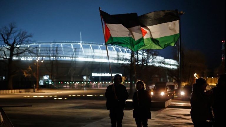 Pro-Palestine supporters ahead of the an international friendly soccer match between Lithuania and Israel in Kaunas, Lithuania, Thursday, Nov. 13, 2025. (Mindaugas Kulbis/AP)