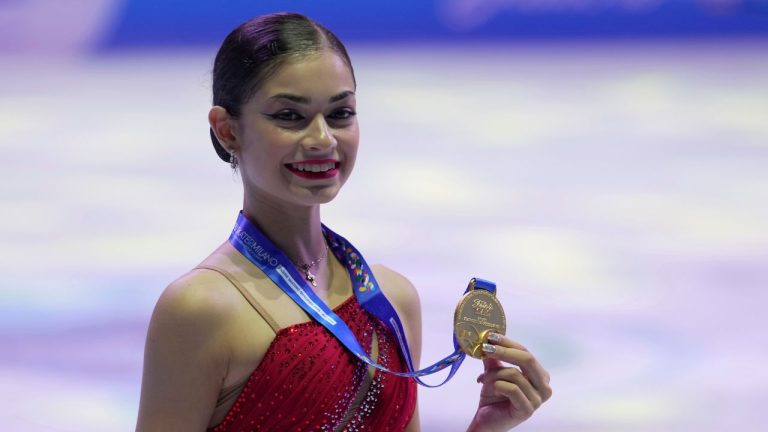 Adeliia Petrosian of Russia, competing as a neutral athlete, with her Gold medal in Women free skating at the ISU Skate to Milano figure skating qualifier 2025, in Beijing, China, Saturday, Sept. 20, 2025. (Mahesh Kumar A./AP)