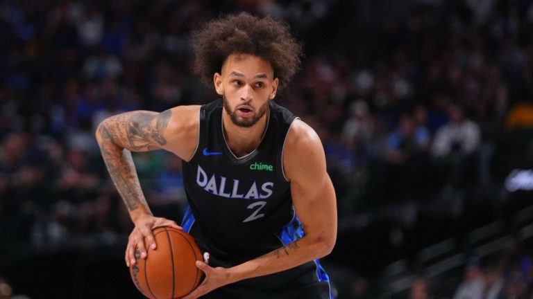 Dallas Mavericks center Dereck Lively II works the floor against the Portland Trail Blazers during the second half of an NBA basketball game Sunday, Nov. 16, 2025, in Dallas. (AP Photo/Julio Cortez)