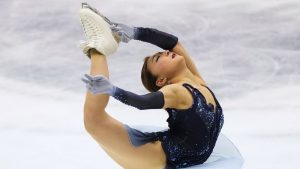 Kaori Sakamoto of Japan performs during the women's short program in the ISU Grand Prix of Figure Skating - NHK Trophy in Kadoma, east of Osaka, western Japan, Friday, Nov. 7, 2025. (AP Photo/Hiro Komae)