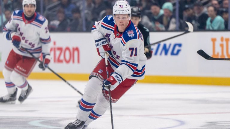 New York Rangers forward Juuso Parssinen skates with the puck during an NHL hockey game against the Seattle Kraken, Saturday, Nov. 1, 2025, in Seattle. (Stephen Brashear/AP)