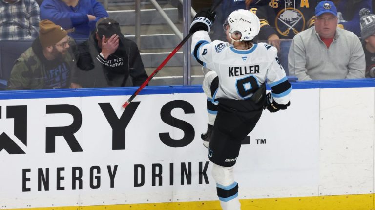 Utah Mammoth right wing Clayton Keller (9) celebrates his game winning goal during the overtime period of a game against the Buffalo Sabres Tuesday, Nov. 4, 2025, in Buffalo, N.Y. (AP Photo/Jeffrey T. Barnes)