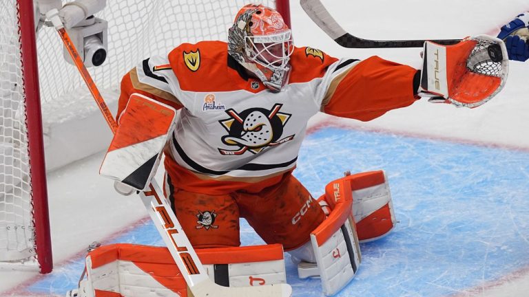 Anaheim Ducks goaltender Lukas Dostal makes a glove save in the first period of an NHL hockey game against the Colorado Avalanche Tuesday, Nov. 11, 2025, in Denver. (David Zalubowski/AP)