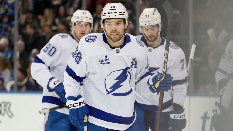 Tampa Bay Lightning left wing Brandon Hagel (38) celebrates with teammates after scoring during the second period of a game against New York Rangers, Saturday, Nov. 29, 2025, in New York. (AP Photo/Yuki Iwamura)