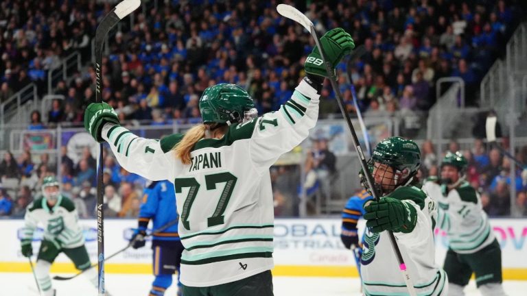 Boston Fleet forward Susanna Tapani (77) celebrates a goal against Toronto Sceptres goaltender Raygan Kirk, not shown, with teammates during third period PWHL action in Toronto on Saturday, Nov. 29, 2025. (Frank Gunn/THE CANADIAN PRESS)