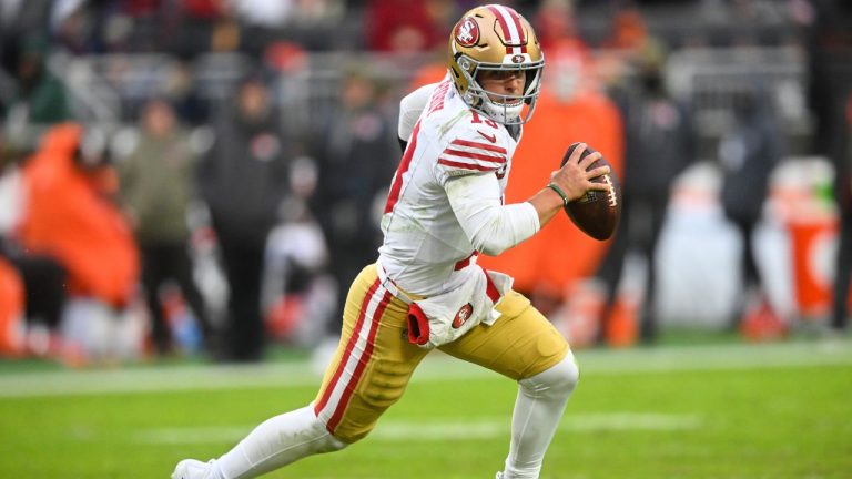 San Francisco 49ers quarterback Brock Purdy rolls out against the Cleveland Browns during the second half of an NFL football game, Sunday, Nov. 30, 2025, in Cleveland. (David Richard/AP)