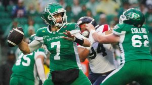 Saskatchewan Roughriders quarterback Trevor Harris (7) throws the football against the Montreal Alouettes during first half CFL football action. (Heywood Yu/CP)