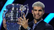 Alcaraz beams with pride as he lifts trophy for year-end No. 1 player