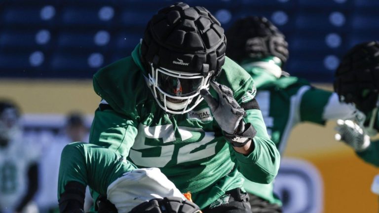 Saskatchewan Roughriders' Jermarcus Hardrick (52) blocks during Grey Cup practice in Winnipeg, Thursday, Nov. 13, 2025. (John Woods/THE CANADIAN PRESS)