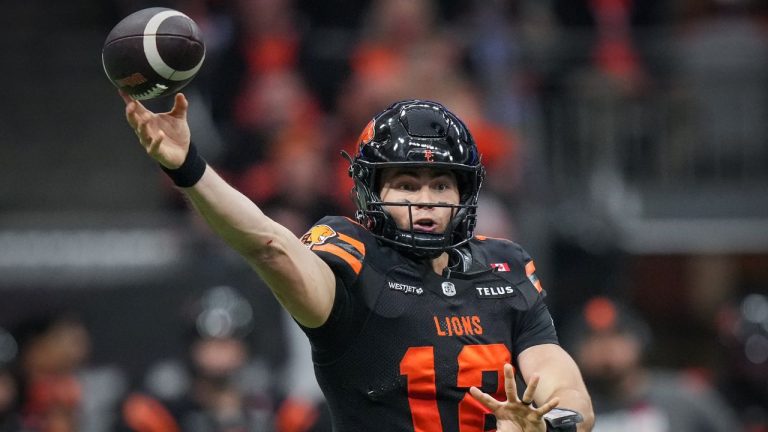 B.C. Lions quarterback Nathan Rourke passes during the second half of the CFL western semifinal football game against the Calgary Stampeders, in Vancouver, on Saturday, November 1, 2025. (Darryl Dyck/THE CANADIAN PRESS)