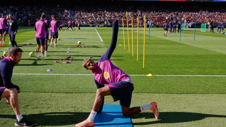 Barcelona's Lamine Yamal exercises during the team's first training session at the venue after its renovation at the Camp Nou stadium in Barcelona, Spain, Friday, Nov. 7, 2025. (AP Photo/Joan Monfort)