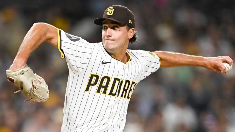 San Diego Padres relief pitcher Kyle Hart delivers during the eighth inning of a baseball game against the Colorado Rockies, Saturday, Sept. 13, 2025, in San Diego. (AP Photo/Denis Poroy)