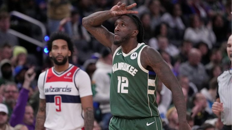 Milwaukee Bucks' Taurean Prince reacts to a three pointer during the second half of an NBA basketball game against the Washington Wizards Wednesday, Oct. 22, 2025, in Milwaukee. (AP Photo/Morry Gash)