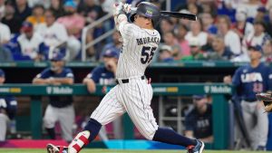 Japan's Munetaka Murakami (55) hits a home run during the second inning a World Baseball Classic game against the United States, Tuesday, March 21, 2023, in Miami. (Marta Lavandier/AP Photo)