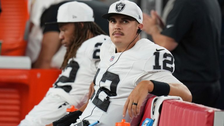 Las Vegas Raiders quarterback Aidan O'Connell (12) warms up before an NFL football game against the Arizona Cardinals, Saturday, Aug.23, 2025, in Glendale, Ariz. (Rick Scuteri/AP Photo)