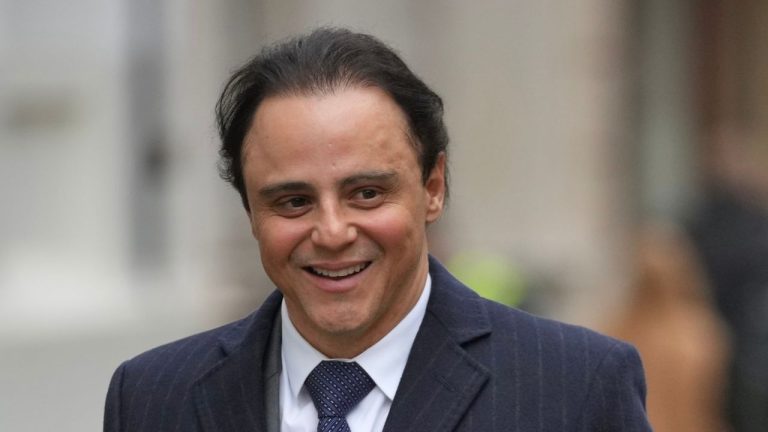 Former Ferrari Formula One driver Felipe Massa leaves the Royal Courts of Justice in London, Thursday, Oct. 30, 2025 as he takes legal action against Formula One Management Limited. (Kin Cheung/AP Photo)