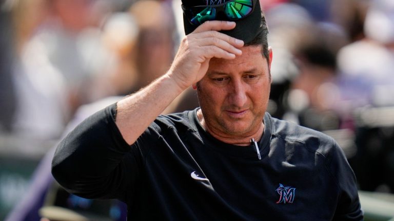 Miami Marlins assistant hitting coach John Mabry stands in the dugout during the seventh inning of a baseball game against the Chicago Cubs, Friday, May 5, 2023, in Chicago. (Erin Hooley/AP)