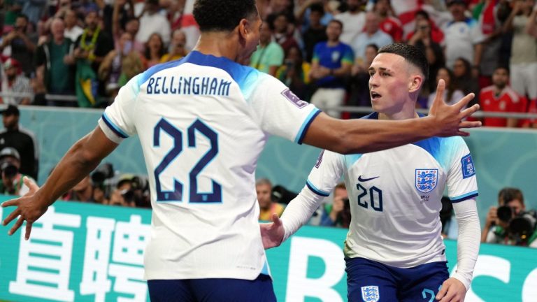 England's Phil Foden celebrates with Jude Bellingham during a FIFA World Cup Group B match at the Ahmad Bin Ali Stadium, Al Rayyan, Qatar, Tuesday Nov. 29, 2022. (via CP)