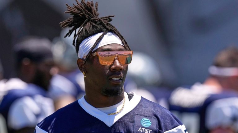 Dallas Cowboys linebacker DeMarvion Overshown stands on the field during training camp Sunday, July 27, 2025, in Oxnard, Calif. (AP Photo/Mark J. Terrill)