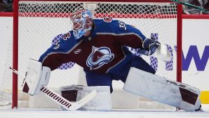 Colorado Avalanche goaltender Mackenzie Blackwood looks for a shot in the third period of a game against the San Jose Sharks Wednesday, Nov. 26, 2025, in Denver. (AP Photo/David Zalubowski)