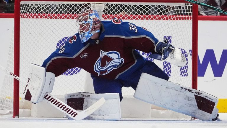 Colorado Avalanche goaltender Mackenzie Blackwood looks for a shot in the third period of a game against the San Jose Sharks Wednesday, Nov. 26, 2025, in Denver. (AP Photo/David Zalubowski)