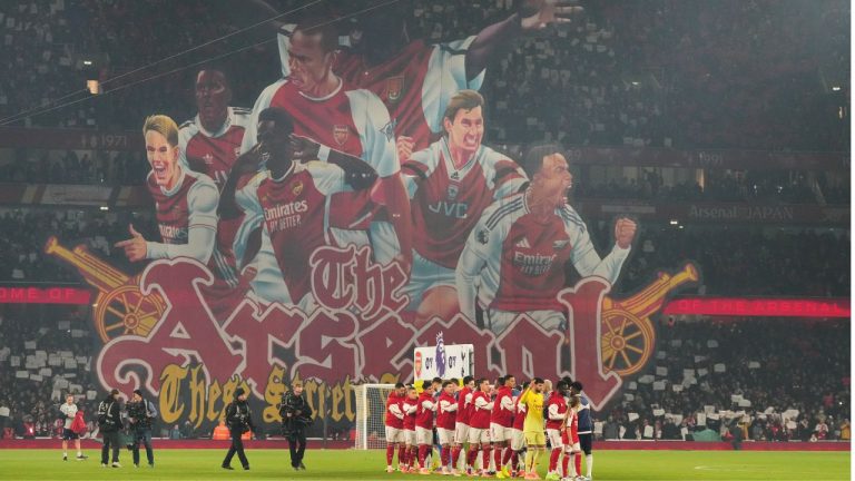 Players come onto the pitch for a Premier League soccer match between Arsenal and Tottenham in London, Sunday, Nov. 23, 2025. (Frank Augstein/AP)