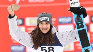 Canada's Abigail Strate celebrates after finishing second in the women's world cup ski jumping in Lillehammer, Norway, Saturday Nov. 22, 2025. (Geir Olsen/NTB Scanpix via AP)