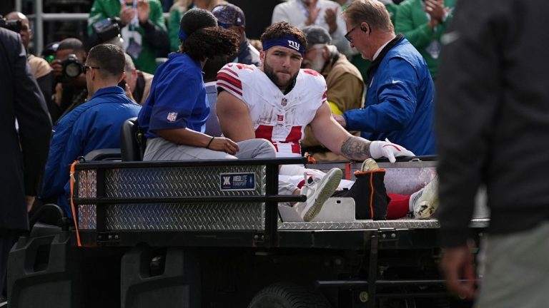 New York Giants running back Cam Skattebo leaves the field after an injury during the first half of an NFL football game against the Philadelphia Eagles on Sunday, Oct. 26, 2025, in Philadelphia. (Matt Rourke/AP)
