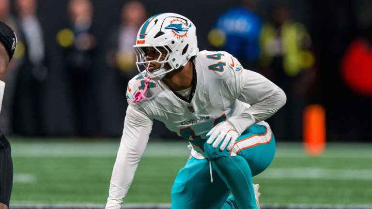 Miami Dolphins linebacker Chop Robinson lines up during the second half of an NFL football game against the Atlanta Falcons, Sunday, Oct. 26, 2025, in Atlanta. (AP Photo/Danny Karnik)