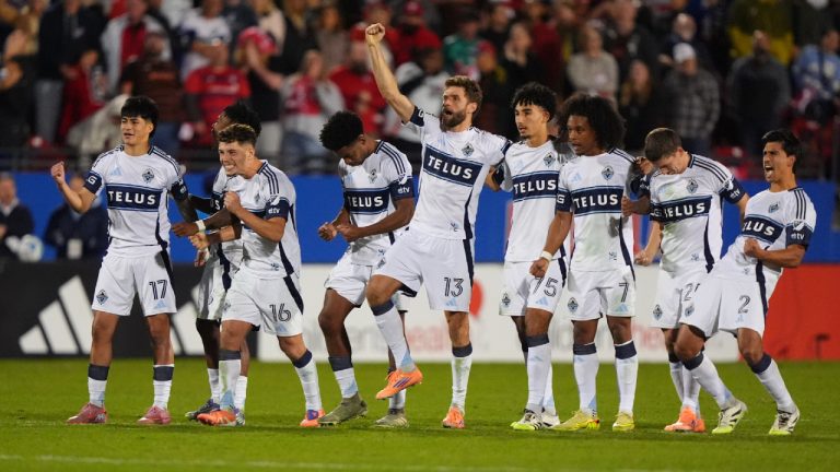 The Vancouver Whitecaps line celebrate a penalty kick goal scored by Belal Halbouni during Game 2 in the first round of MLS soccer's Western Conference playoffs against the FC Dallas in Frisco, Texas, Saturday, Nov. 1, 2025. (LM Otero/AP)