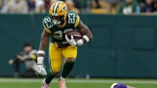 Emanuel Wilson runs for 107 yards and two TDs as Packers pound Vikings