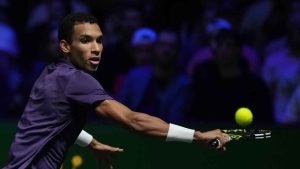 Canada's Felix Auger-Aliassime returns to Kazakhstan's Alexander Bublik during a semifinal match of the Paris Masters tennis tournament in Paris. (Christophe Ena/AP)