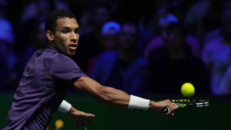 Canada's Felix Auger-Aliassime returns to Kazakhstan's Alexander Bublik during a semifinal match of the Paris Masters tennis tournament in Paris. (Christophe Ena/AP)
