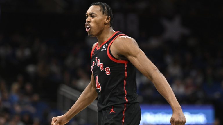 Toronto Raptors forward Scottie Barnes (4) celebrates a score during the second half of an NBA basketball game against the Orlando Magic, Tuesday, March 4, 2025, in Orlando, Fla. (AP Photo/Phelan M. Ebenhack)