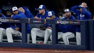 Toronto Blue Jays players watch from their dugout during the 10th inning in Game 7 of baseball's World Series against the Los Angeles Dodgers, Saturday, Nov. 1, 2025, in Toronto. (Ashley Landis/AP)