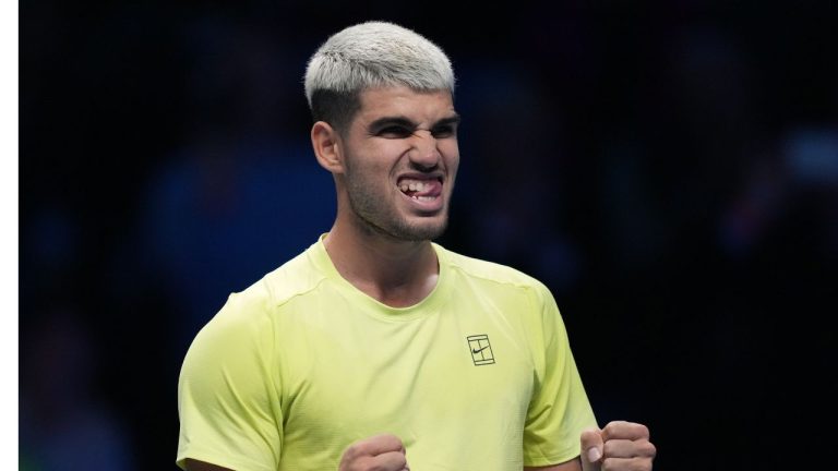 Spain's Carlos Alcaraz celebrates after winning against United States' Taylor Fritz during their tennis match of the ATP World Tour Finals, in Turin, Italy, Tuesday, Nov. 11, 2025. (Antonio Calanni/AP)