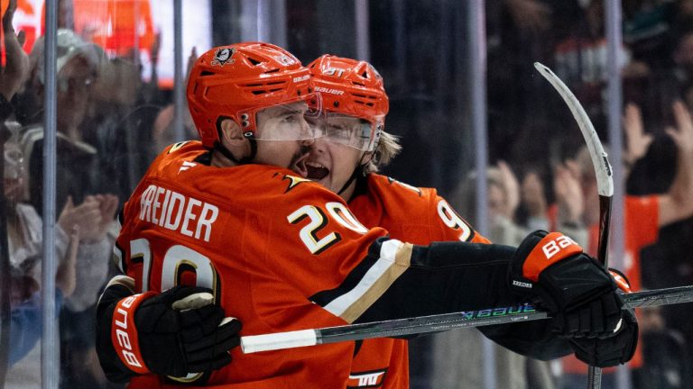 Anaheim Ducks left wing Chris Kreider (20) celebrates his goal with center Leo Carlsson (91) during the first period of an NHL hockey game against the Pittsburgh Penguins, Tuesday, Oct. 14, 2025, in Anaheim, Calif. (Kyusung Gong/AP)