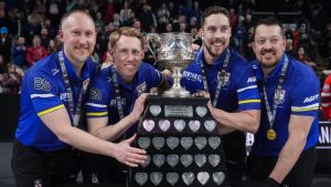 Alberta-Jacobs skip Brad Jacobs, from left to right, third Marc Kennedy, second Brett Gallant, and lead Ben Hebert pose with the Brier tankard after defeating Manitoba-Dunstone during the final at the Brier, in Kelowna, B.C., on Sunday, March 9, 2025. (Darryl Dyck/CP)