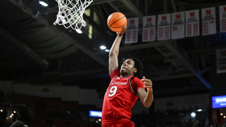 Rutgers forward Dylan Grant (9) dunks the ball during the first half of an NCAA college basketball game against Maryland, Sunday, Feb. 9, 2025, in College Park, Md. (Terrance Williams/AP Photo)